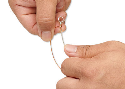 wire being wrapped around a wrapped loop
